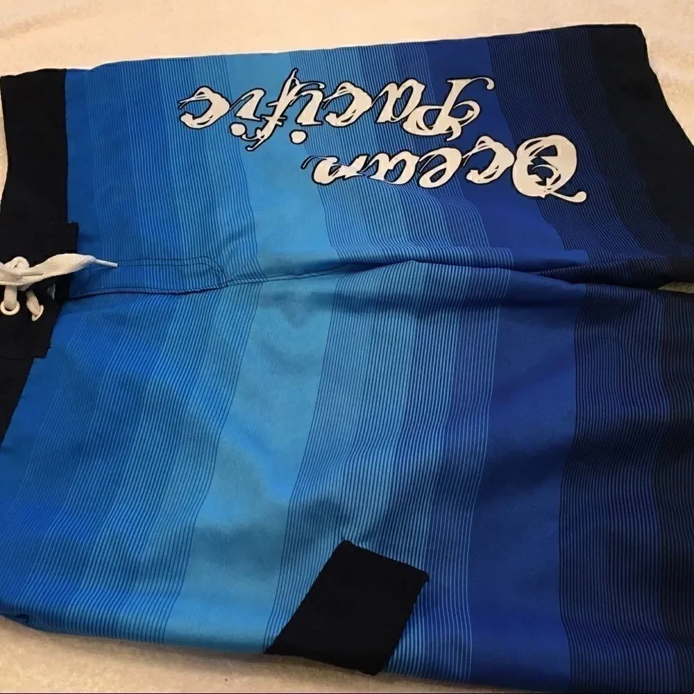 Ocean Pacific Medium swim shorts blue black trunks good condition tie at waist